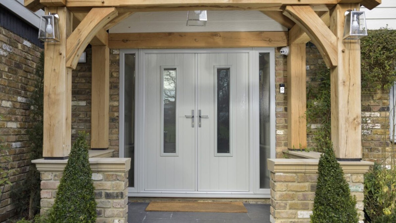 Contemporary composite double doors with glazed detailing