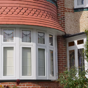 Traditional white bay window installation on a family home in Wantage