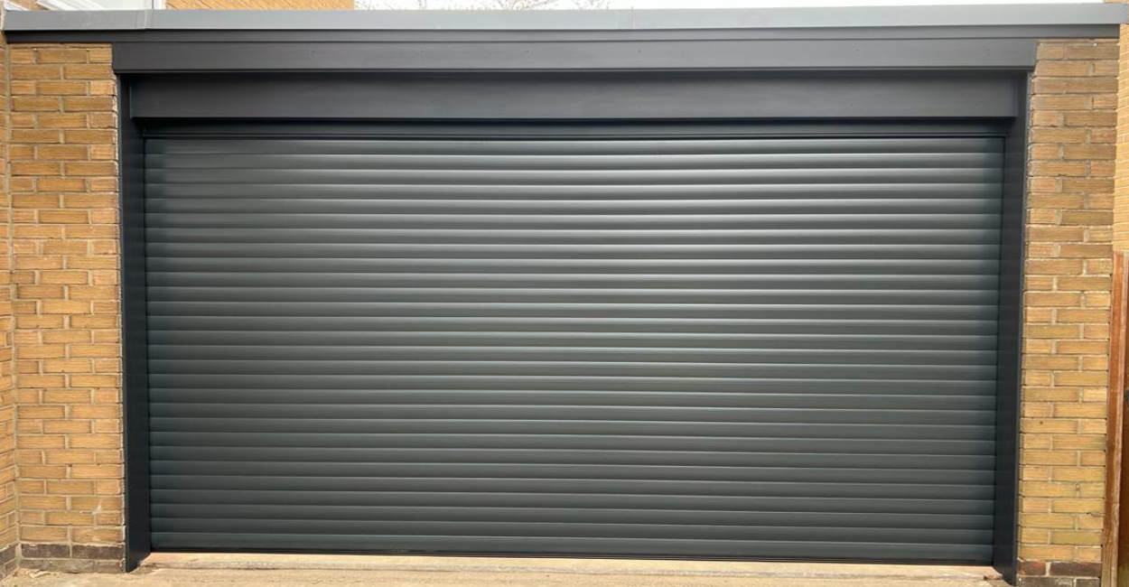 Contemporary anthracite grey electric roller garage door