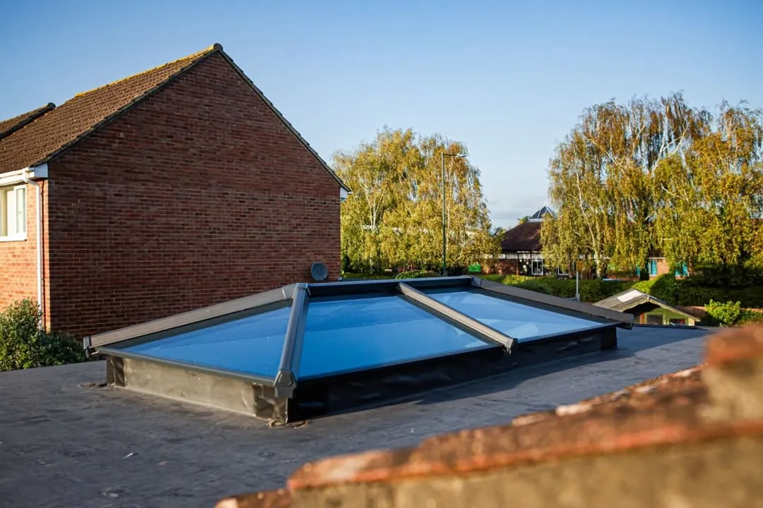 Anthracite grey glazed lantern set into a new flat conservatory roof, Witney