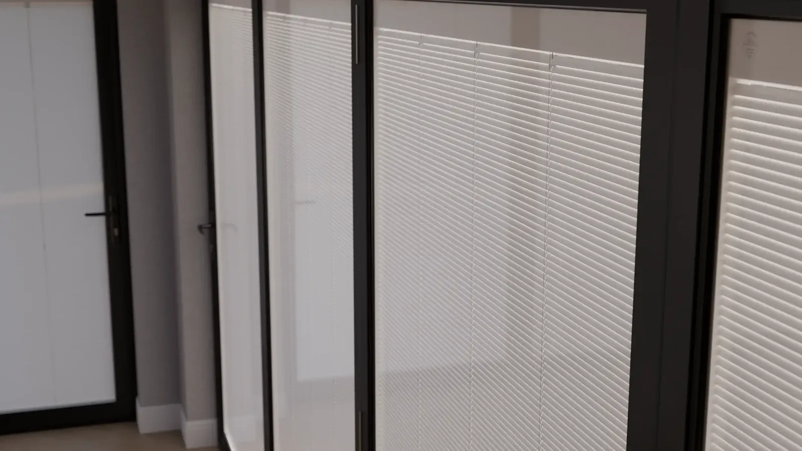 Style example: white venetian integral blinds lowered in bifold doors